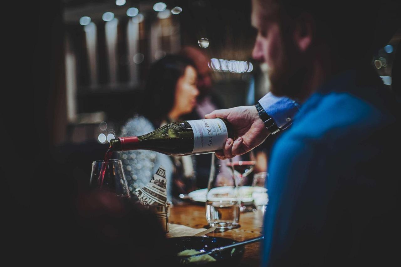 Radisson Collection, Strand Hotel, Стокхолм Екстериор снимка Wine being poured at a wine bar